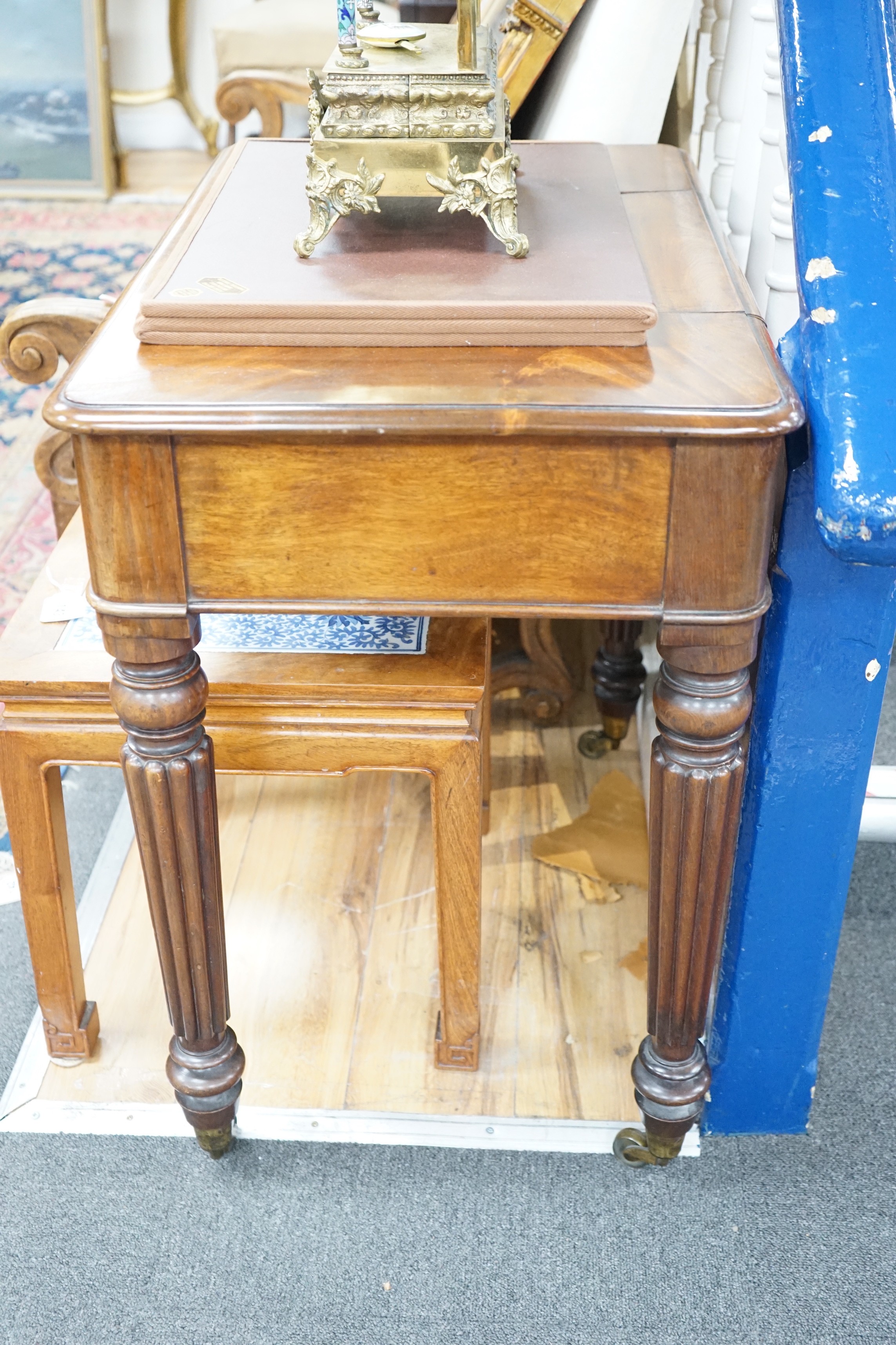 An early Victorian mahogany writing table stamped M Willson, 68 Great Queen Street, width 76cm, depth 48cm, height 74cm